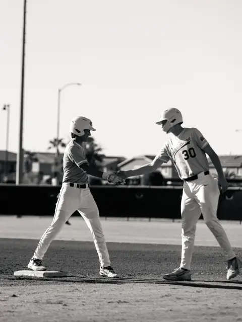 GBG Colorado 2029 baserunners shaking hands