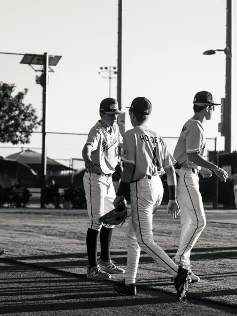 GBG Colorado 2029 players walking across the infield