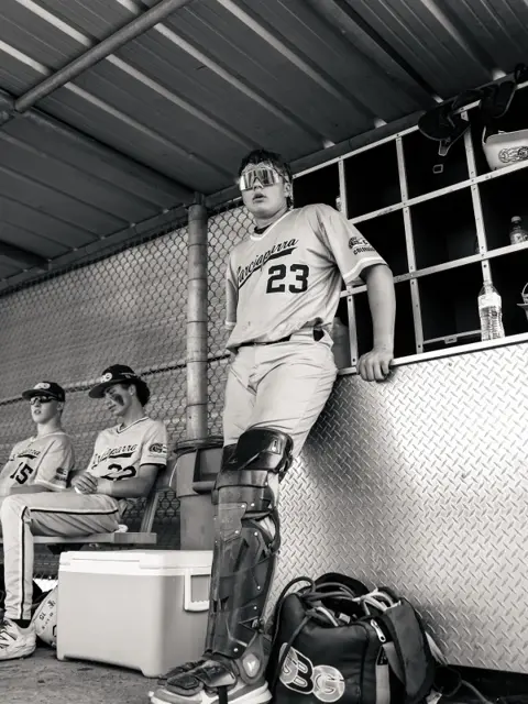 GBG Colorado catcher standing in the dugout