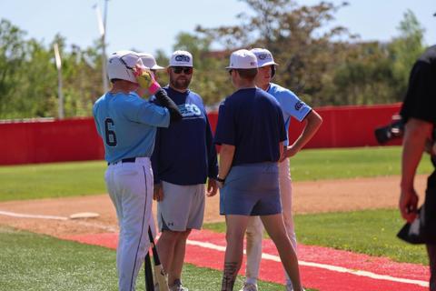 GBG Colorado coach talking with a baserunner at second base