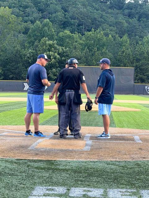 GBG Colorado coaches meeting with the home plate umpire